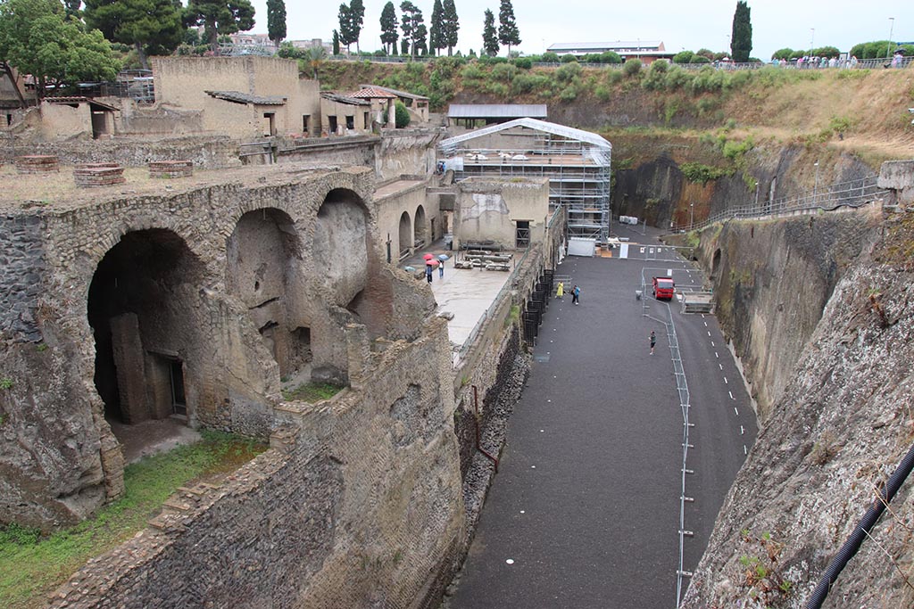 Herculaneum, June 2025. Looking along the ancient shoreline, now covered, towards the terrace and the Suburban baths. Photo courtesy of Klaus Heese.